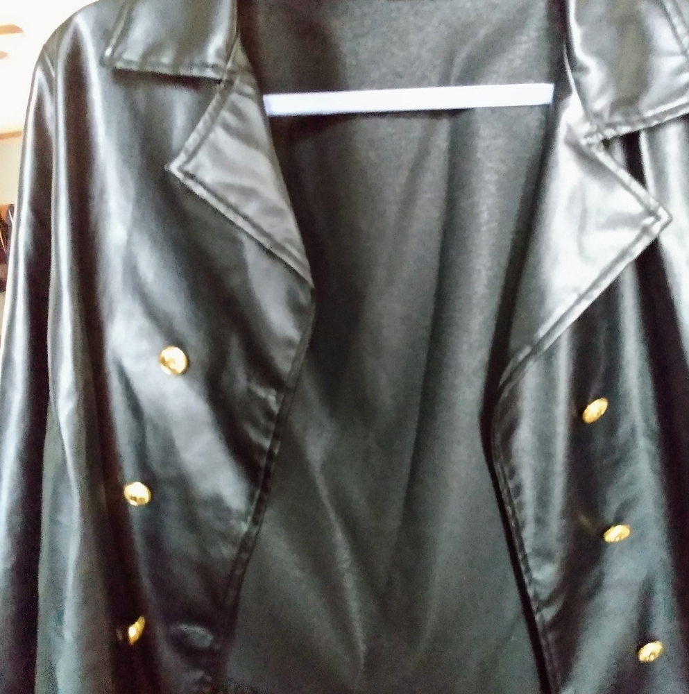 Black leather jacket with gold buttons